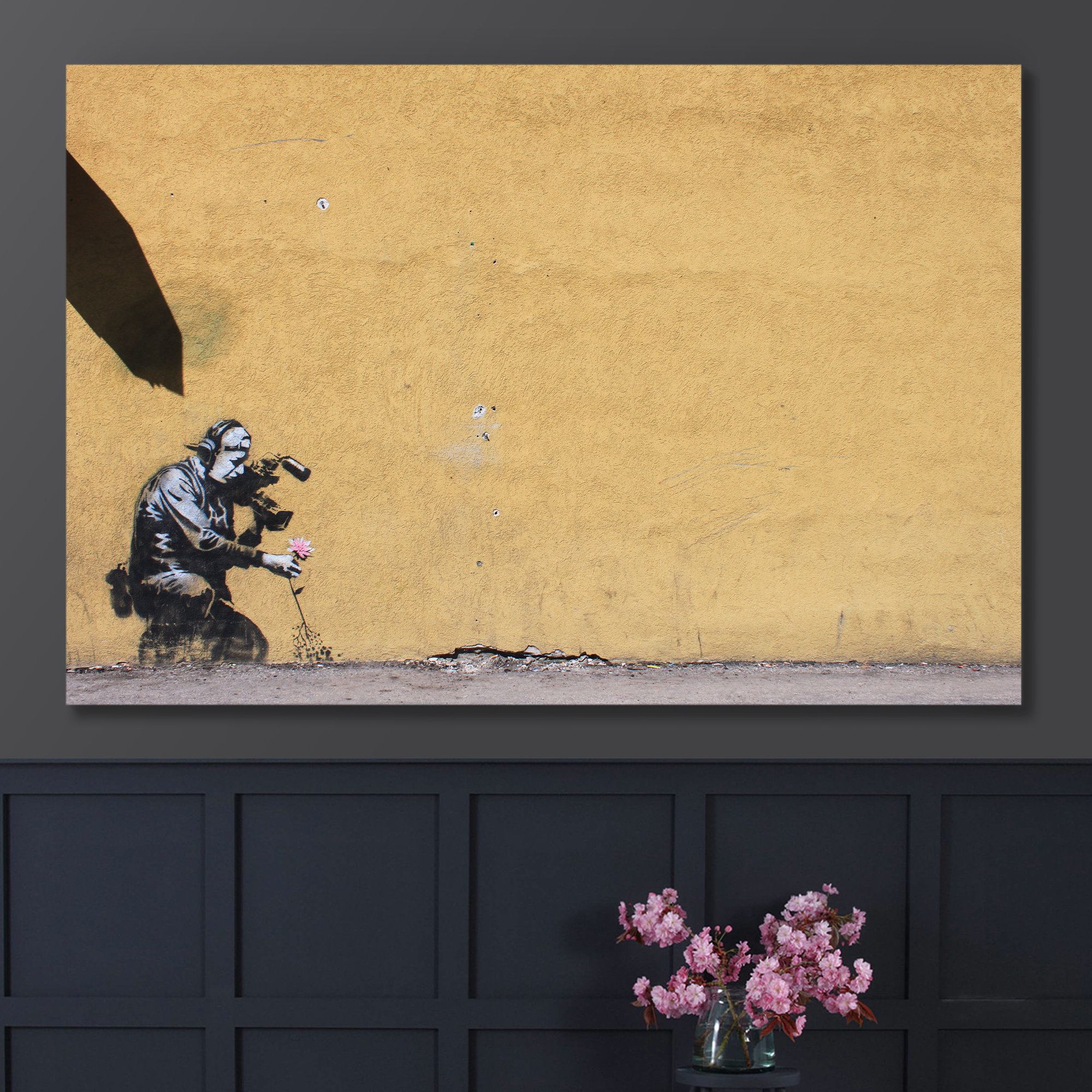 Camera Man With Flowers by Banksy