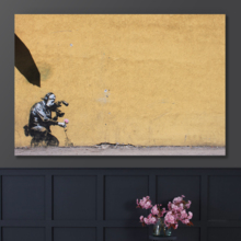 Camera Man With Flowers by Banksy