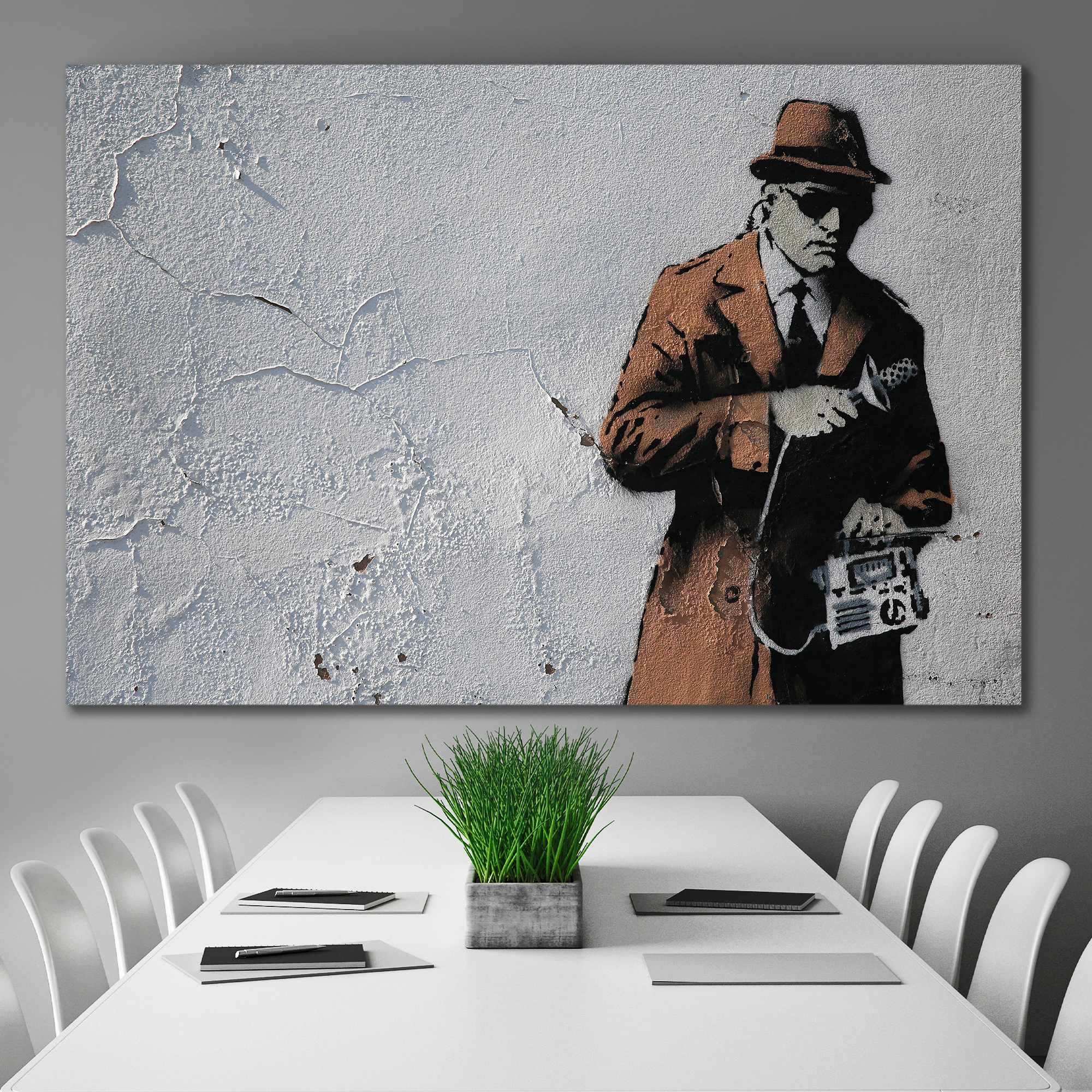 Spy Booth Man Holding Recording Device by Banksy