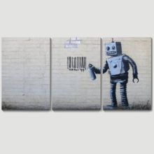 Banksy canvas home wall art featuring his work Robot Artwork hanging on a beige wall. 